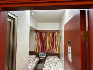 Postel nebo postele na pokoji v ubytování Piaget guest house