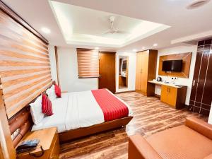 Postel nebo postele na pokoji v ubytování Hotel Sizzling Starr