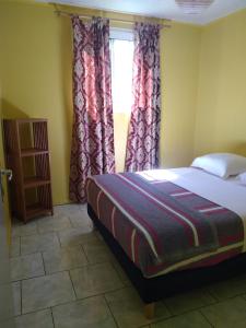 Postel nebo postele na pokoji v ubytování OLATIKA - gîte des cascades