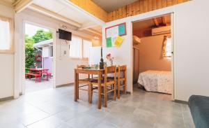 Postel nebo postele na pokoji v ubytování Camping OASI