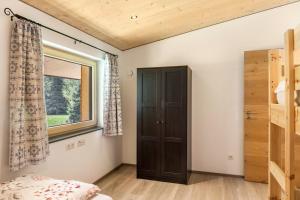 Postel nebo postele na pokoji v ubytování Kwelle zur Natur Gamsberg