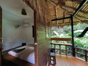 Postel nebo postele na pokoji v ubytování Oasis Koh Chang