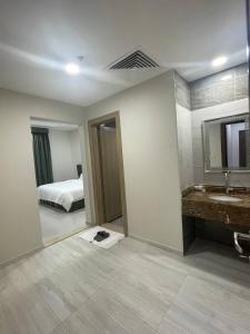 Phòng tắm tại ديار المشاعر للشقق المخدومة Diyar Al Mashaer For Serviced Apartments