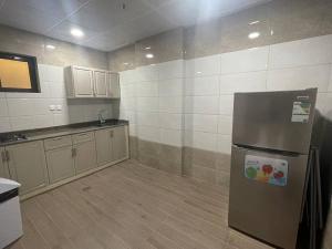 Köök või kööginurk majutusasutuses شقق ديار المشاعر للشقق المخدومة Diyar Al Mashaer For Serviced Apartments