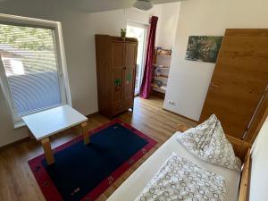 Łóżko lub łóżka w pokoju w obiekcie Loft Kammleitn