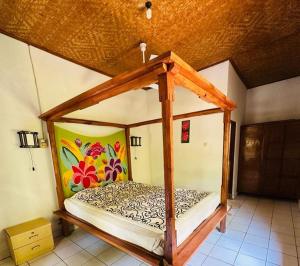 Postel nebo postele na pokoji v ubytování Pondok Wisata Grya Sari