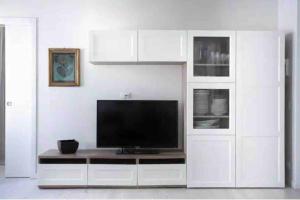 Η κουζίνα ή μικρή κουζίνα στο Amadeus Apartment: a due passi dal Duomo