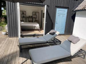 Patio nebo venkovní prostory v ubytování Bokis - Modern Forest Cottage