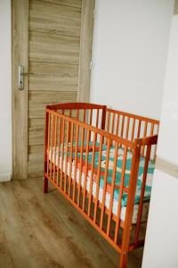 Łóżko lub łóżka w pokoju w obiekcie Apartament Magnolia -centrum