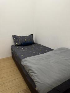 Postel nebo postele na pokoji v ubytování ITCC Manhattan Suites by Stay In 3pax