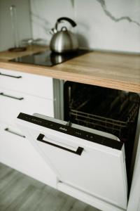 Kuchnia lub aneks kuchenny w obiekcie Apartament Magnolia -centrum