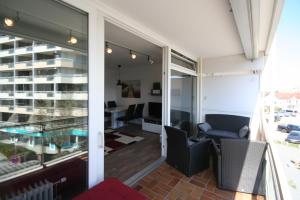 Rõdu või terrass majutusasutuses Am Brandungsbad App 3 5 inkl WLAN +4 fotot