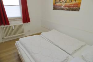 Postel nebo postele na pokoji v ubytování Goldene Ruh App 406 inkl WLAN