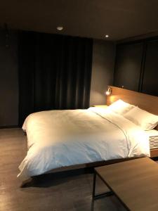 Postel nebo postele na pokoji v ubytování Soho Hotel