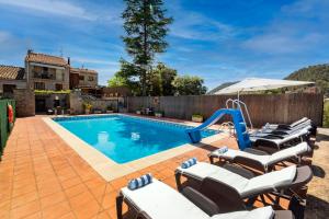 The swimming pool at or close to 21 Sleeps Private Pool Villa & BBQ Near Barcelona