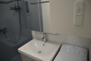 Photo de la galerie de l'établissement Appartement 2 pièces RDC jardin dans résidence avec piscine, à Arzon