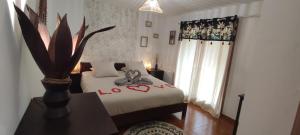 Postel nebo postele na pokoji v ubytování Chambre d'hôte Amouratcha