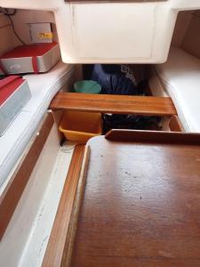 an open drawer in a boat with aartments at Voilier Love Nice in Dourgne