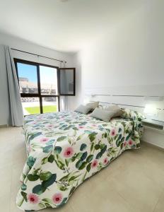 Ένα ή περισσότερα κρεβάτια σε δωμάτιο στο Villa Samara
