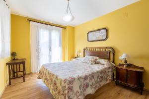 Postel nebo postele na pokoji v ubytování Casa Dieste Apartamentos Turísticos en Boltaña