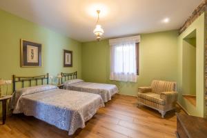 Postel nebo postele na pokoji v ubytování Casa Dieste Apartamentos Turísticos en Boltaña