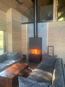 Posezení v ubytování Skarvruet Lodge Funäsdalen