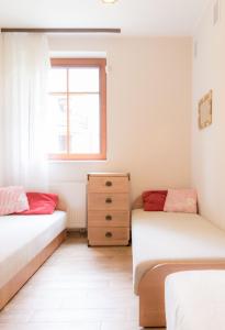 Postel nebo postele na pokoji v ubytování Willa Teresa