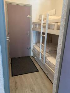 Postel nebo postele na pokoji v ubytování Appartement Centre station - Les Deux Alpes + 6 fotografií