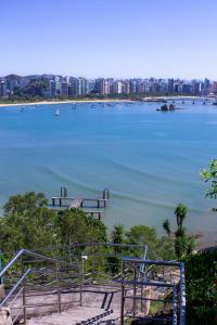 a view of a large body of water with a city at Hotel Senac Ilha do Boi in Vitória