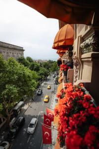 a view from a building with flowers on a street at Park Hyatt Istanbul - Macka Palas in Istanbul