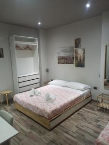 Postel nebo postele na pokoji v ubytování Le Mirage