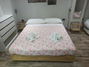 Postel nebo postele na pokoji v ubytování Le Mirage