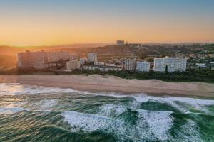 an aerial view of a beach at sunset at 65 Key Largo in Kingsburgh