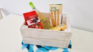 a wooden crate filled with books and other items at Paraiso Studio in Playa Paraiso