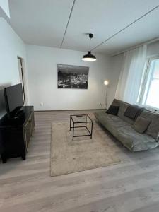 Posezení v ubytování Kotimaailma - Kaunis 3MH asunto Pohjois-Haagassa
