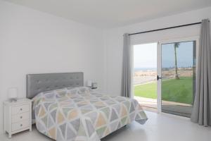 Ένα ή περισσότερα κρεβάτια σε δωμάτιο στο Chalet Marpacos +71 φωτογραφίες