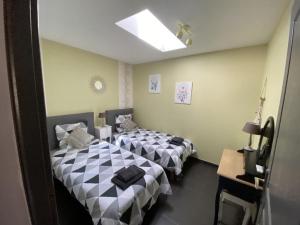 Voodi või voodid majutusasutuse Villa Sylva toas