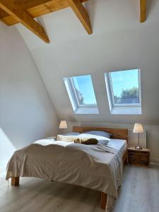 Posteľ alebo postele v izbe v ubytovaní SKYLINE Penthouse Apartment - Luxus & Zentral