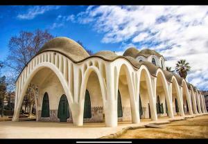 a building with arches on the side of it at Modern Loft in Terrassa in Terrassa