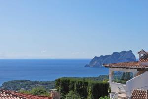 a view of the ocean from a house at Villa Amare in Benissa