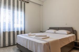 Кровать или кровати в номере Casa Di Nelo