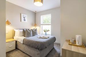 a bedroom with a bed and a window at Stay @ Baker Street Derby in Derby