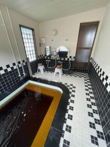 Kolam renang di atau dekat dengan コテージR 広々空間と自然豊かなエリアでRelaxステイ バーベキューセットあり4名様まで同一料金