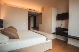 TV a/nebo společenská místnost v ubytování Mod 05 Bike Hotel