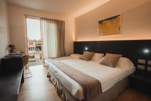 Postel nebo postele na pokoji v ubytování Mod 05 Bike Hotel