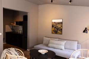 Posezení v ubytování Rey Apartments + 15 fotografií