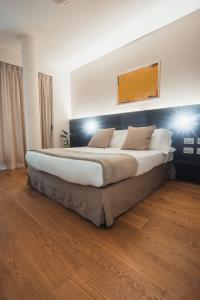 Postel nebo postele na pokoji v ubytování Mod 05 Bike Hotel