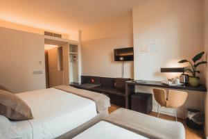 TV a/nebo společenská místnost v ubytování Mod 05 Bike Hotel