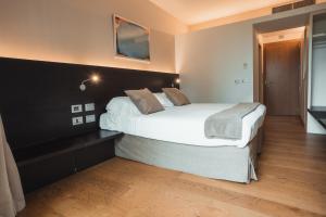 Postel nebo postele na pokoji v ubytování Mod 05 Bike Hotel
