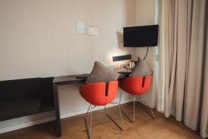 TV a/nebo společenská místnost v ubytování Mod 05 Bike Hotel